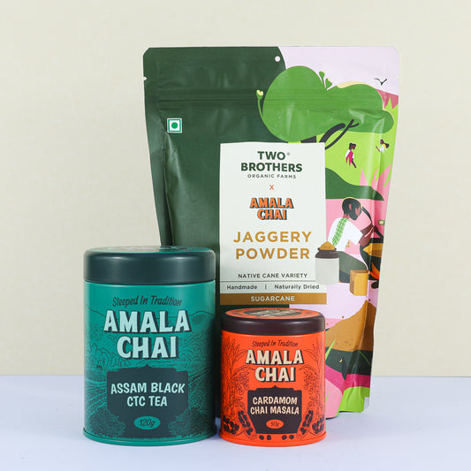 Front view of jaggery powder, cardamom chai masala tin, assam black tea tin