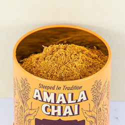 Close up view of turmeric chai masala tin